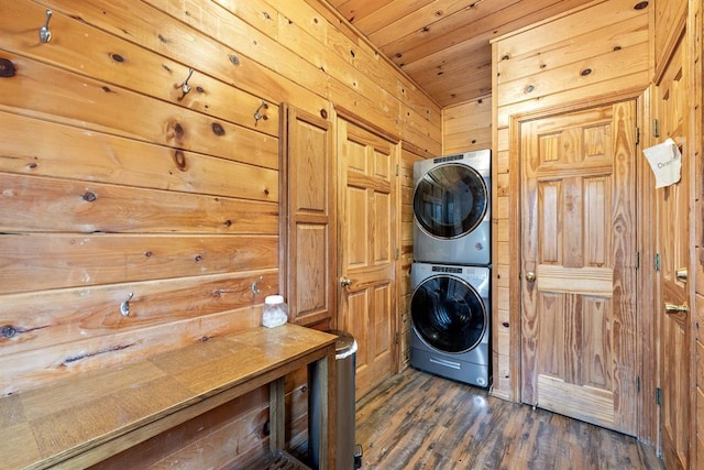 184 Almond Ln, Hochatown, OK 74728 - washroom with stacked washing machine and dryer, wooden walls, dark wood-style flooring, and wood ceiling