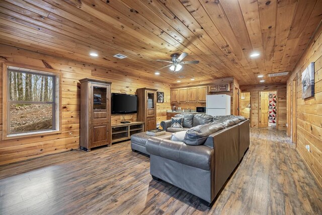 184 Almond Ln, Hochatown, OK 74728 - living room featuring hardwood / wood-style floors, wooden walls, recessed lighting, wooden ceiling, and a ceiling fan