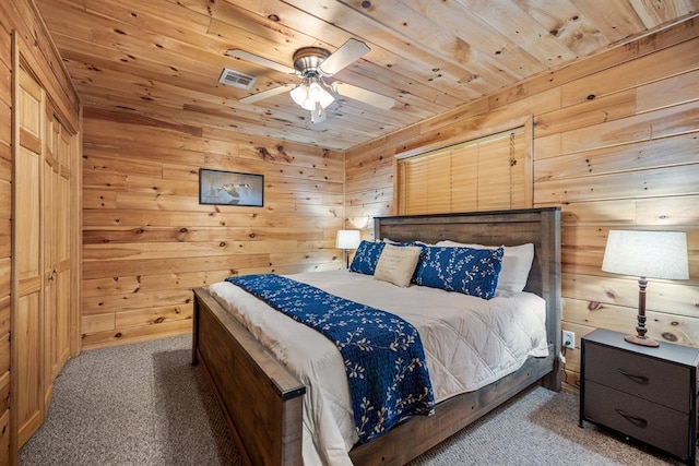 184 Almond Ln, Hochatown, OK 74728 - bedroom featuring wood ceiling, carpet, and wooden walls