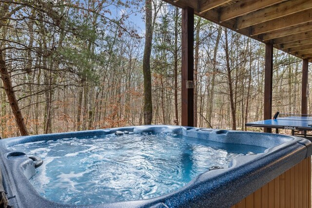 184 Almond Ln, Hochatown, OK 74728 - wooden deck featuring a hot tub