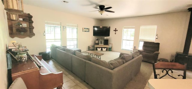 319 W Cedar Ln, Minco, OK 73059 - living area with a ceiling fan, plenty of natural light, and light tile patterned flooring