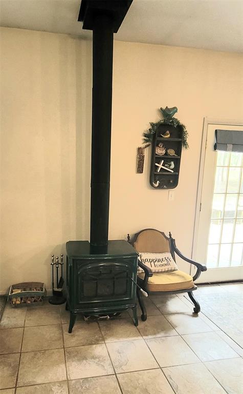 319 W Cedar Ln, Minco, OK 73059 - detailed view of a wood stove