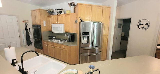319 W Cedar Ln, Minco, OK 73059 - kitchen featuring white appliances, a sink, light brown cabinets, and light countertops