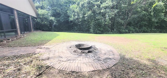 319 W Cedar Ln, Minco, OK 73059 - view of green lawn featuring a fire pit