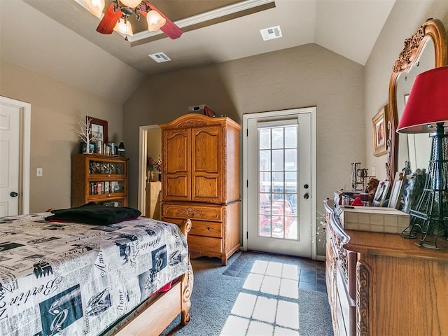 913 E Harrison Ave, Guthrie, OK 73044 - bedroom featuring lofted ceiling, access to exterior, light carpet, and ceiling fan