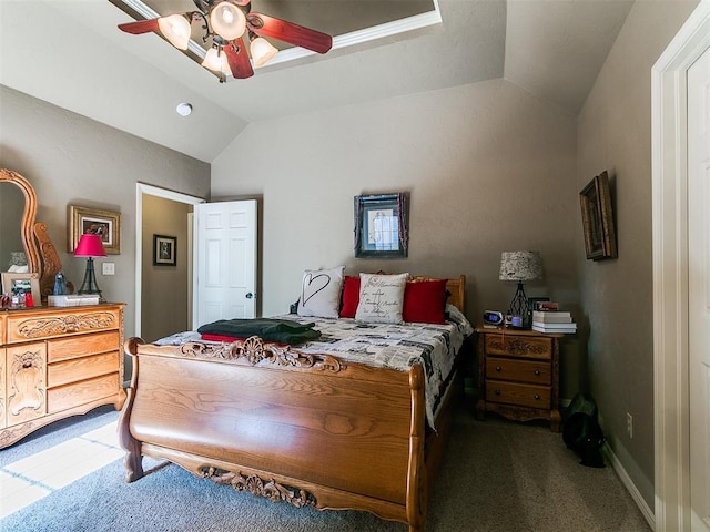 913 E Harrison Ave, Guthrie, OK 73044 - bedroom featuring lofted ceiling, carpet floors, and a ceiling fan