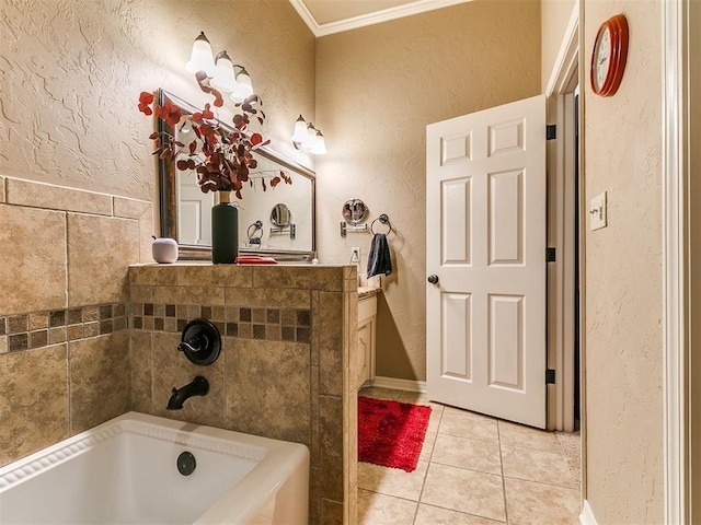 913 E Harrison Ave, Guthrie, OK 73044 - bathroom with a textured wall, a garden tub, crown molding, and tile patterned flooring