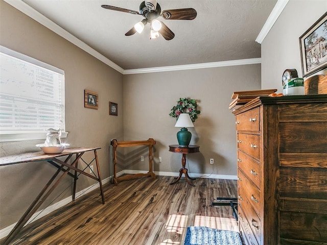 913 E Harrison Ave, Guthrie, OK 73044 - office area with wood finished floors, ceiling fan, baseboards, and crown molding