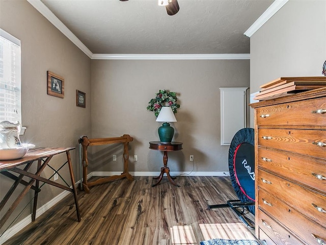 913 E Harrison Ave, Guthrie, OK 73044 - home office featuring wood finished floors, crown molding, baseboards, and ceiling fan