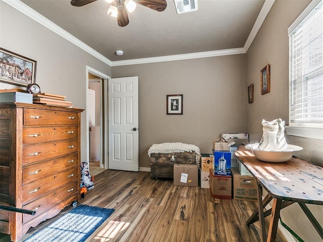 913 E Harrison Ave, Guthrie, OK 73044 - bedroom with wood finished floors, ornamental molding, and baseboards