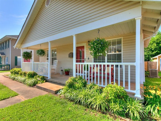 913 E Harrison Ave, Guthrie, OK 73044 - entrance to property with a porch and central AC