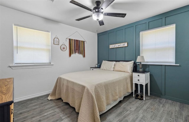 109 W 6th St, Amber, OK 73004 - bedroom with wood finished floors, ceiling fan, and baseboards