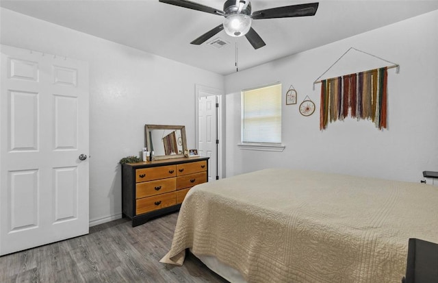 109 W 6th St, Amber, OK 73004 - bedroom featuring wood finished floors, a ceiling fan, and baseboards