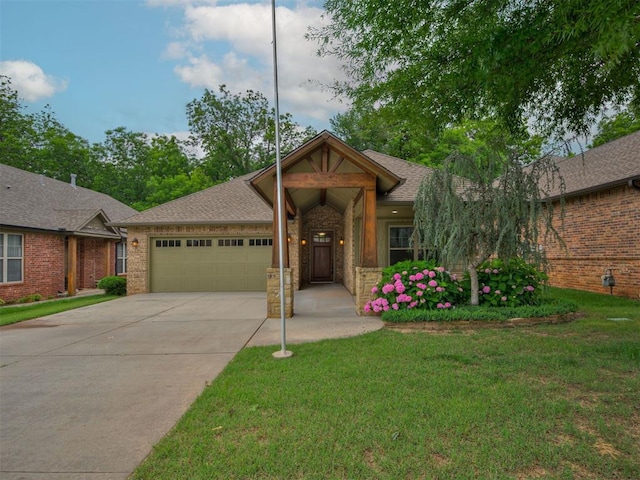 2120 Turtle Creek Dr, Norman, OK 73071 - view of front of home with an attached garage, concrete driveway, a front yard, brick siding, and a shingled roof