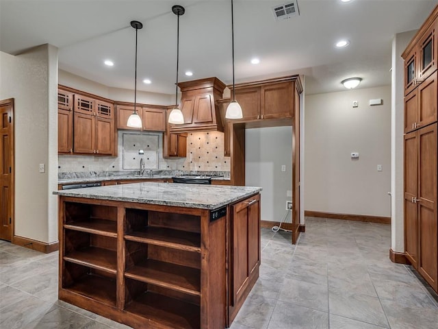 2120 Turtle Creek Dr, Norman, OK 73071 - kitchen featuring open shelves, baseboards, brown cabinets, a center island, and recessed lighting