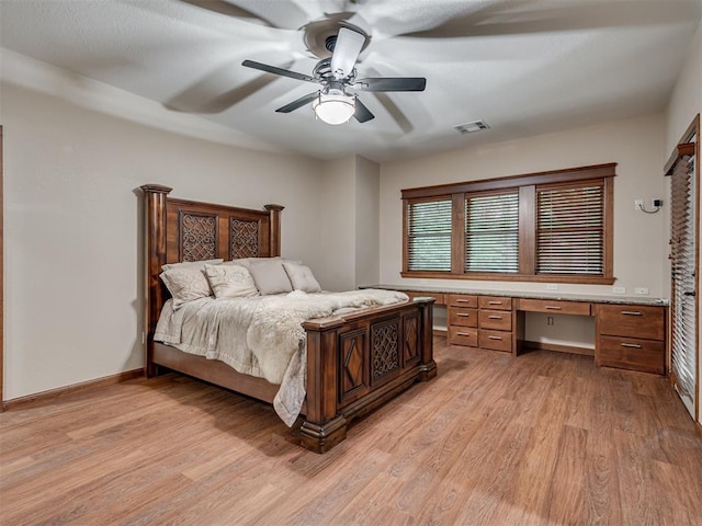 2120 Turtle Creek Dr, Norman, OK 73071 - bedroom with light wood-type flooring and a ceiling fan