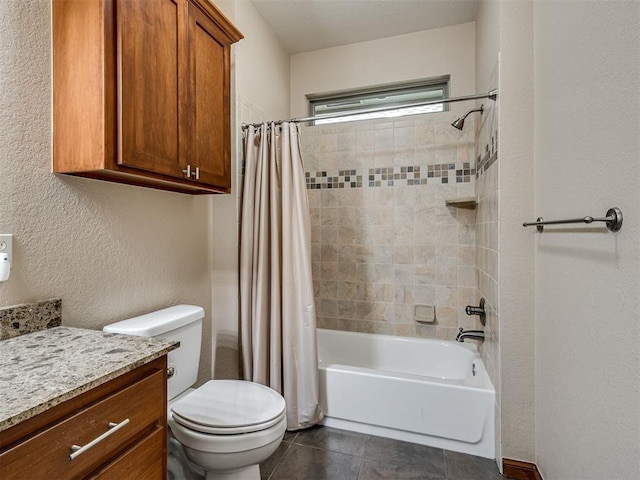 2120 Turtle Creek Dr, Norman, OK 73071 - bathroom featuring vanity, shower / tub combo with curtain, toilet, tile patterned flooring, and a textured wall