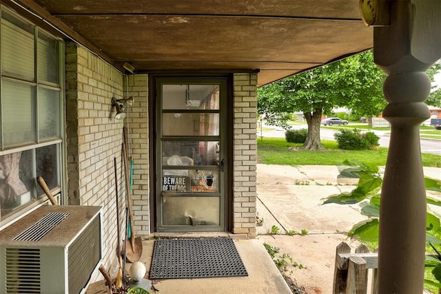 407 S Norman Ave, Moore, OK 73160 - property entrance featuring brick siding