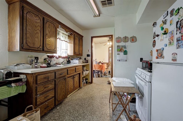 407 S Norman Ave, Moore, OK 73160 - kitchen with white appliances and light countertops