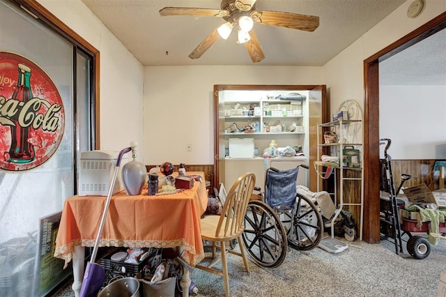 407 S Norman Ave, Moore, OK 73160 - carpeted dining area with ceiling fan and a textured ceiling