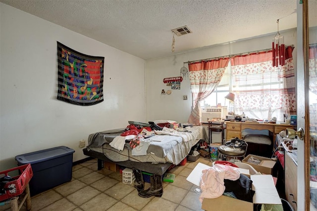 407 S Norman Ave, Moore, OK 73160 - tiled bedroom with a textured ceiling