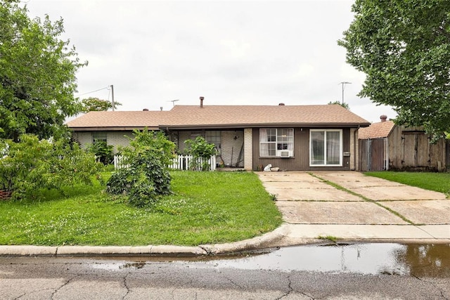 407 S Norman Ave, Moore, OK 73160 - ranch-style home with driveway and brick siding