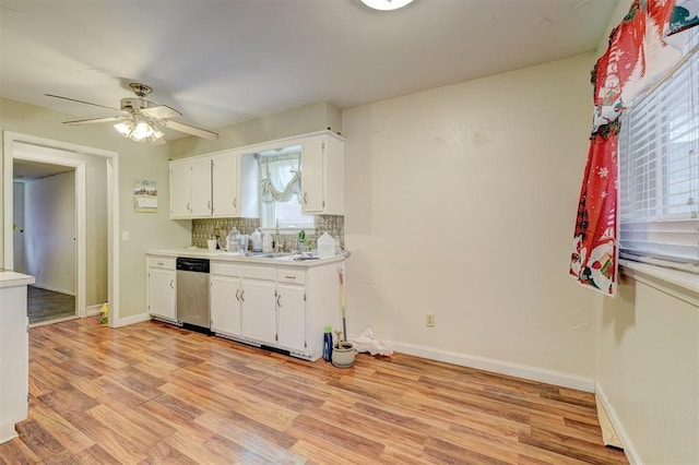 601 Oak Creek Dr, Yukon, OK 73099 - kitchen with dishwasher, white cabinets, and light wood-type flooring