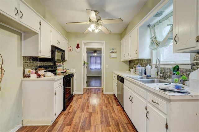 601 Oak Creek Dr, Yukon, OK 73099 - kitchen featuring black appliances, a sink, ceiling fan, and decorative backsplash