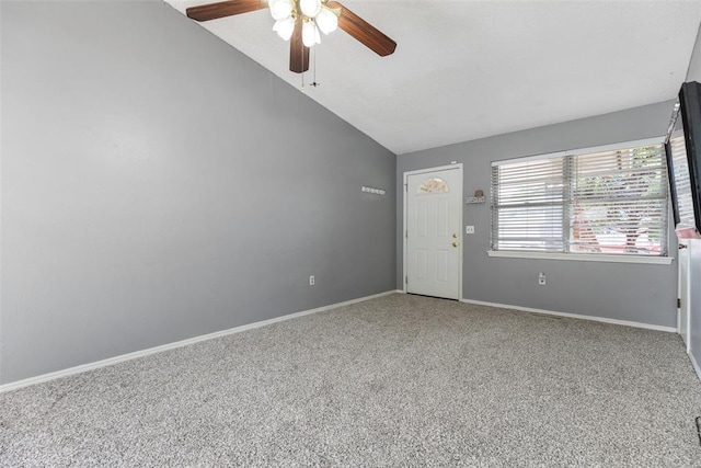 616 Willow Ridge Pl, Edmond, OK 73003 - empty room with vaulted ceiling, a ceiling fan, carpet, and baseboards
