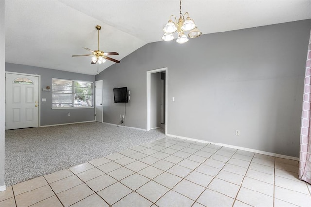 616 Willow Ridge Pl, Edmond, OK 73003 - unfurnished room featuring lofted ceiling, ceiling fan, a chandelier, baseboards, and light carpet