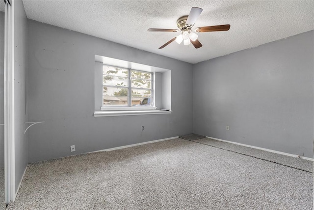 616 Willow Ridge Pl, Edmond, OK 73003 - empty room with carpet, a textured ceiling, ceiling fan, and baseboards