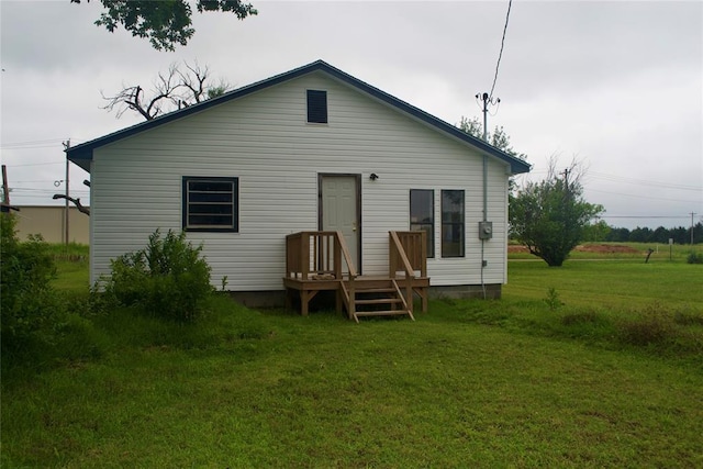 812 S 1st Ave, Stroud, OK 74079 - back of house with a lawn