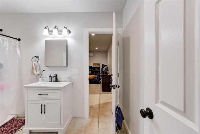 full bath with vanity, tile patterned floors, a shower with curtain, ensuite bathroom, and recessed lighting