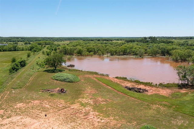 aerial view of sparsely populated area with a nearby body of water