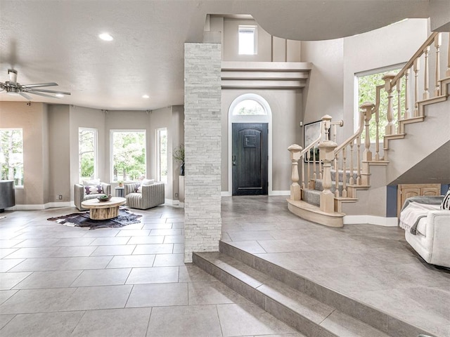 2113 Highlands Lndg, Edmond, OK 73013 - foyer featuring plenty of natural light, ceiling fan, and recessed lighting