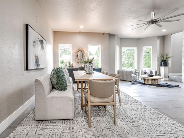 2113 Highlands Lndg, Edmond, OK 73013 - dining room with ceiling fan, recessed lighting, a textured ceiling, and a textured wall