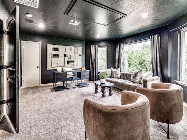 2113 Highlands Lndg, Edmond, OK 73013 - living area featuring attic access and carpet floors