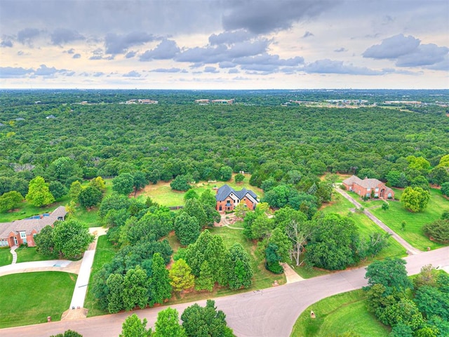 2113 Highlands Lndg, Edmond, OK 73013 - aerial view of property's location with a heavily wooded area