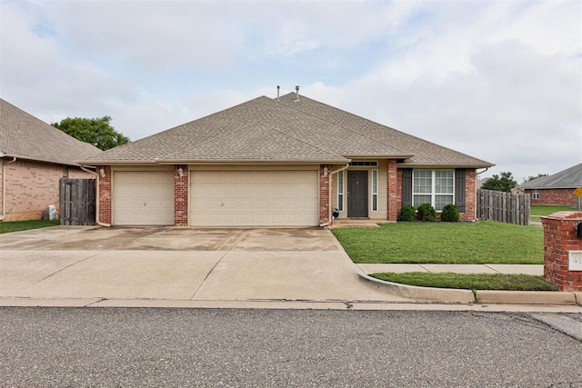 405 Bright Angel Trl, Edmond, OK 73003 - ranch-style home featuring an attached garage, concrete driveway, brick siding, and a shingled roof