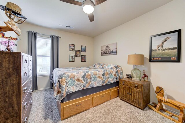 405 Bright Angel Trl, Edmond, OK 73003 - bedroom with carpet and ceiling fan