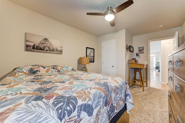 405 Bright Angel Trl, Edmond, OK 73003 - carpeted bedroom featuring ceiling fan