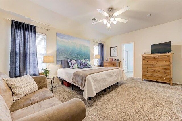 405 Bright Angel Trl, Edmond, OK 73003 - bedroom with carpet flooring, a ceiling fan, baseboards, and lofted ceiling