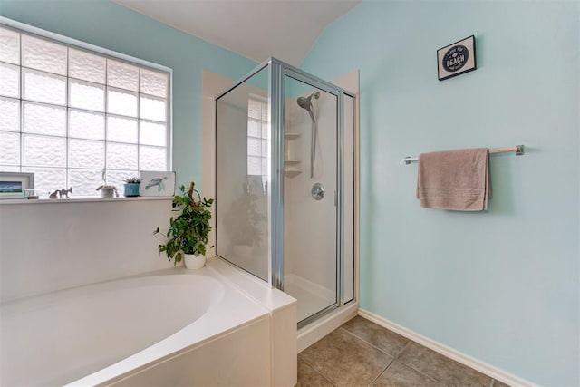 405 Bright Angel Trl, Edmond, OK 73003 - full bath with a bath, a stall shower, tile patterned flooring, and vaulted ceiling