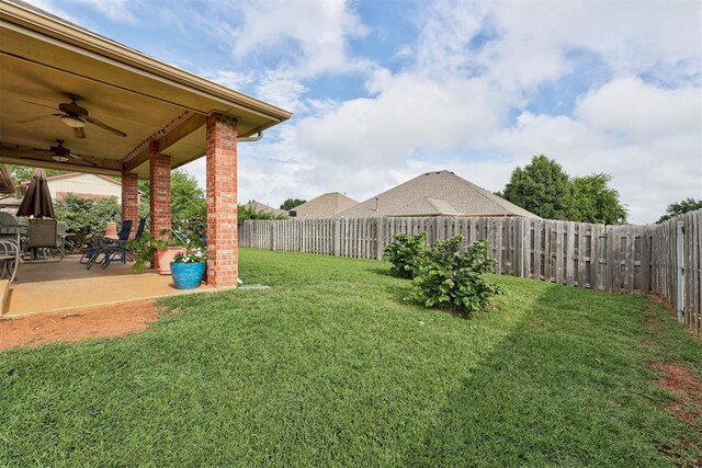 405 Bright Angel Trl, Edmond, OK 73003 - view of yard featuring ceiling fan and a patio