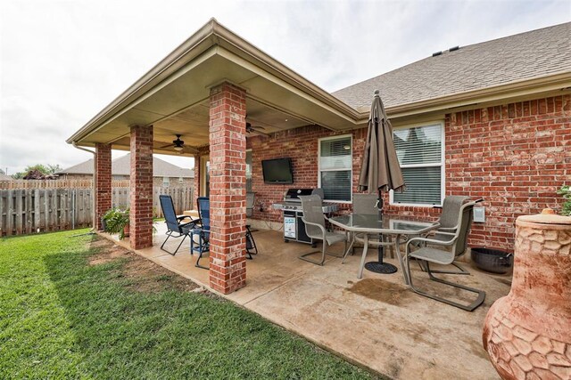 405 Bright Angel Trl, Edmond, OK 73003 - view of patio / terrace with ceiling fan, grilling area, and outdoor dining space