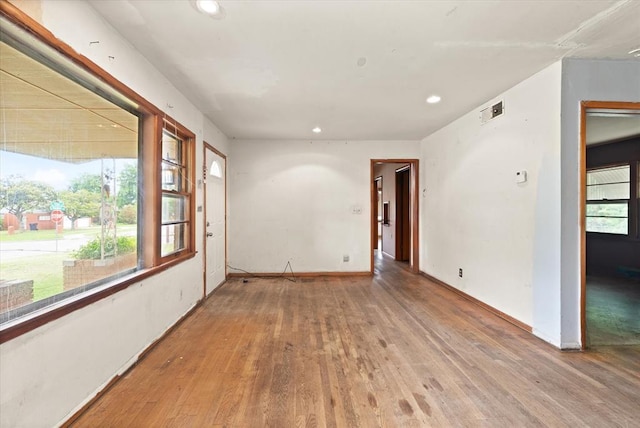 5321 S Douglas Ave, Oklahoma City, OK 73109 - spare room with wood finished floors, recessed lighting, and baseboards