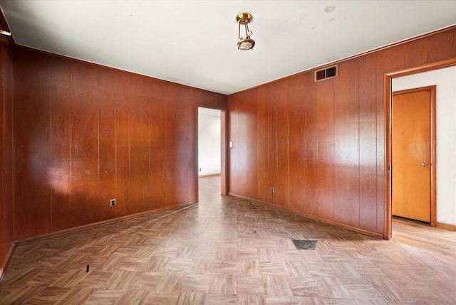 5321 S Douglas Ave, Oklahoma City, OK 73109 - spare room with wood walls and baseboards