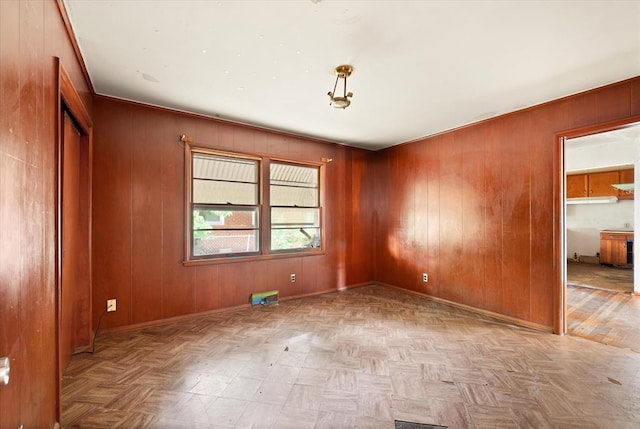 5321 S Douglas Ave, Oklahoma City, OK 73109 - empty room featuring wooden walls and baseboards