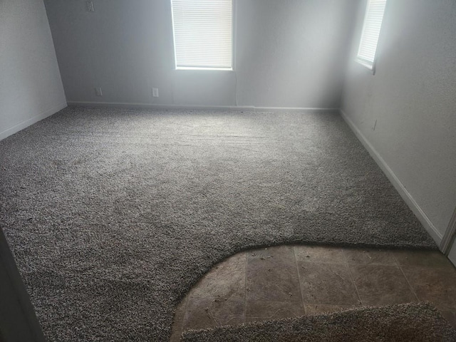 1003 E Whittaker St, Shawnee, OK 74801 - unfurnished room with baseboards and carpet