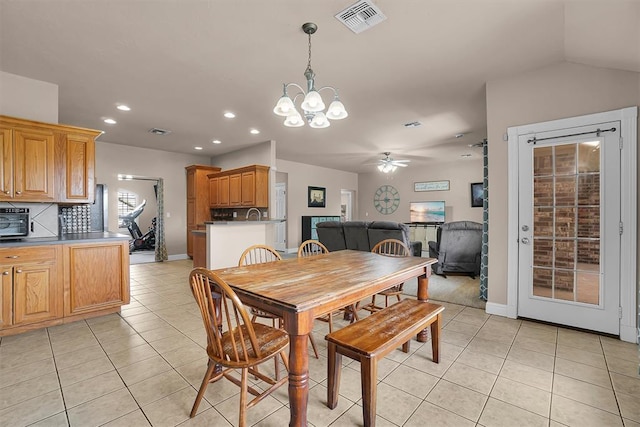 1204 Sheryl Ln, Altus, OK 73521 - dining area with light tile patterned floors, a chandelier, ceiling fan, recessed lighting, and baseboards